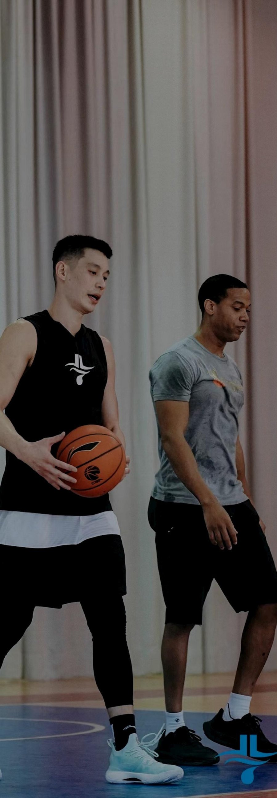 Coach Rickey Huckaby on court with Jeremy Lin